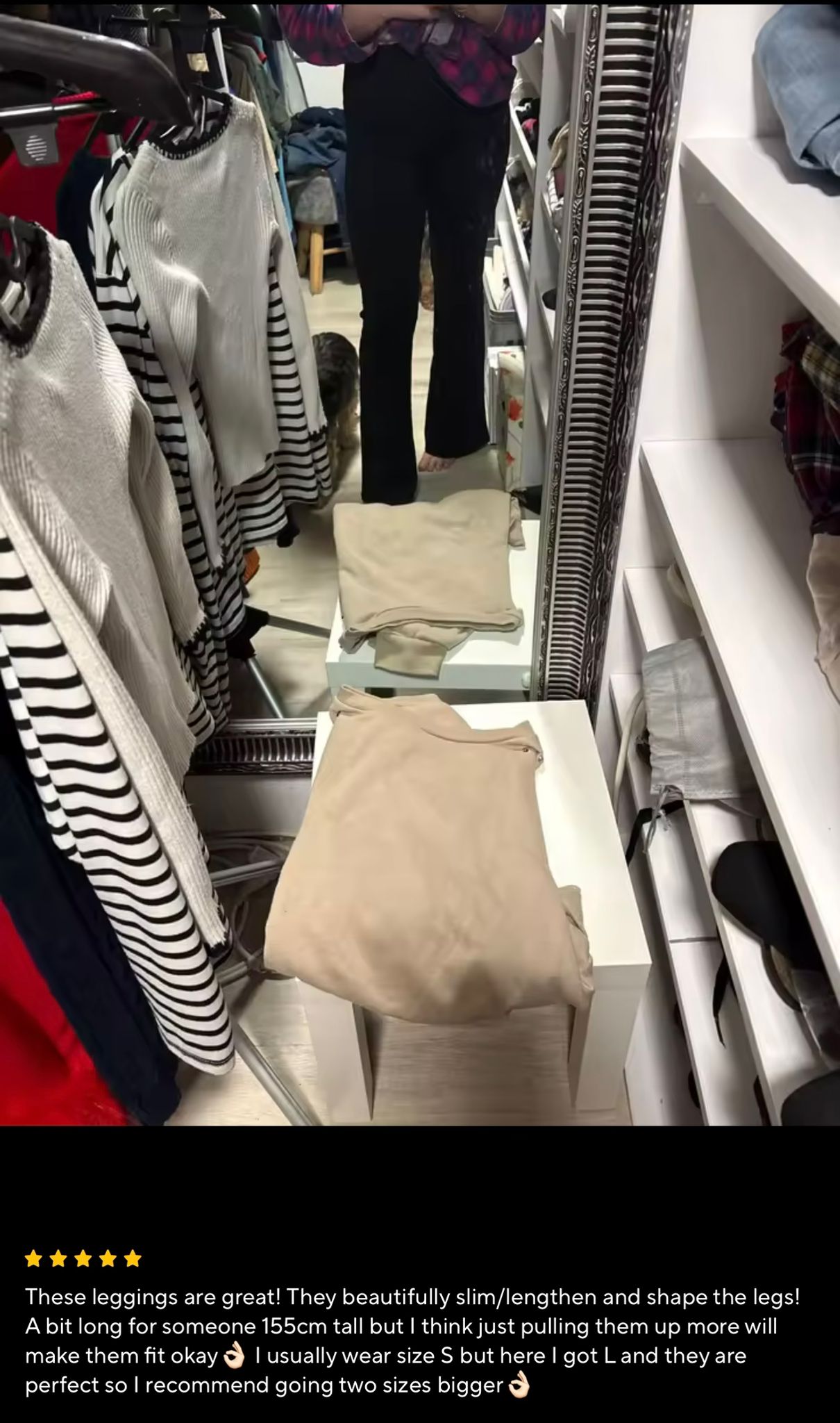 Customer mirror review showing black leggings