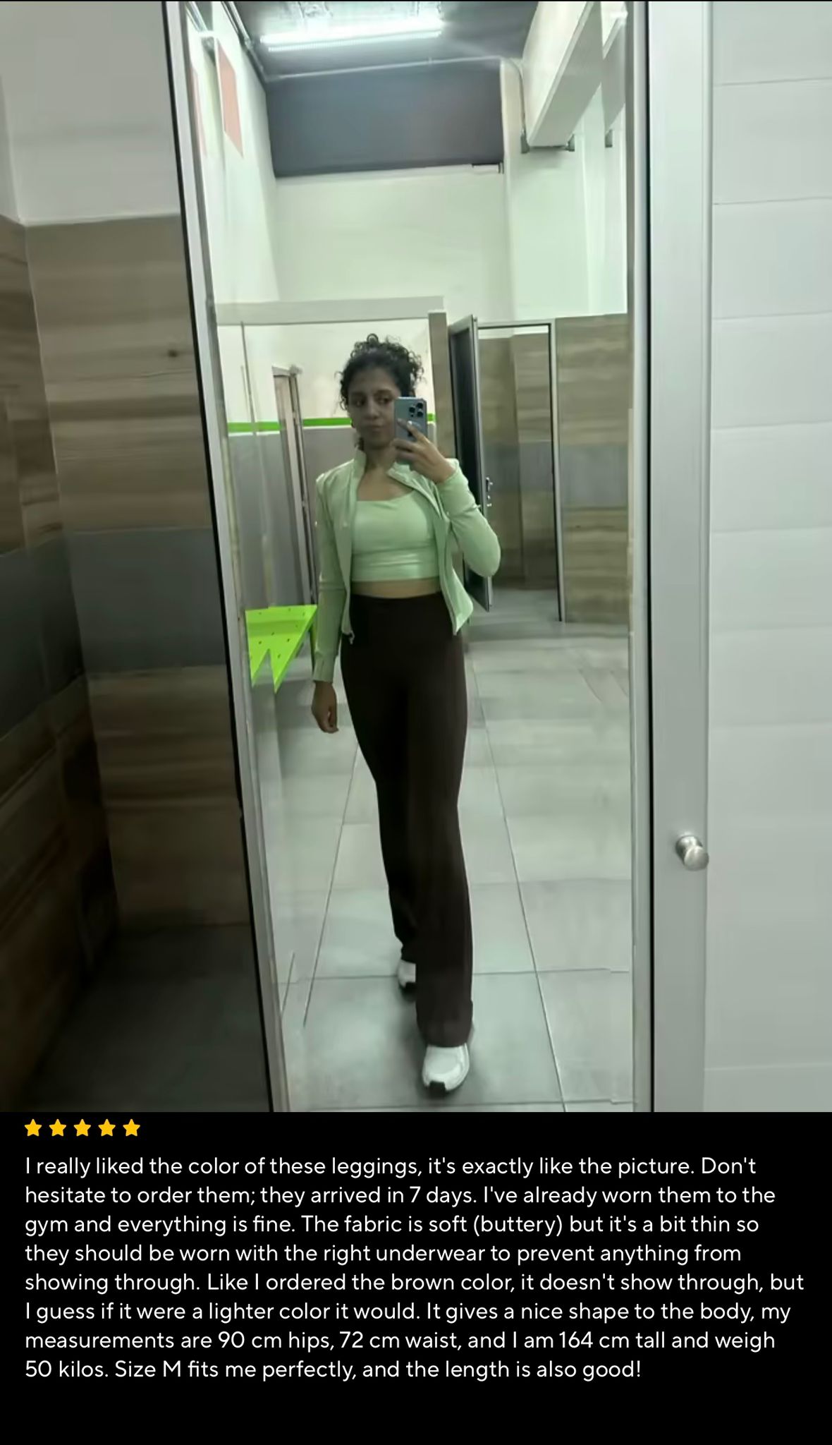 Customer mirror selfie wearing taupe leggings