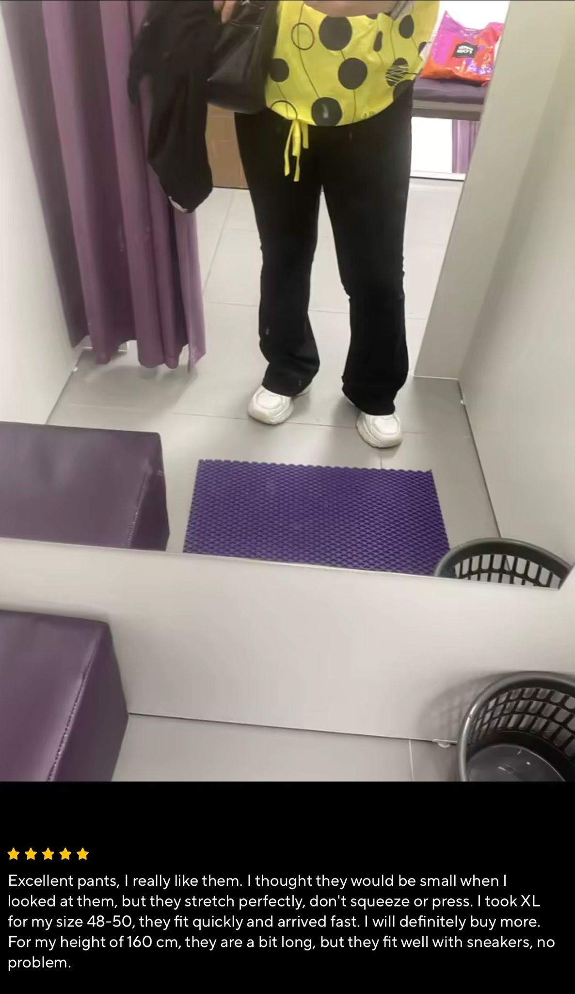 Customer fitting room photo wearing black leggings